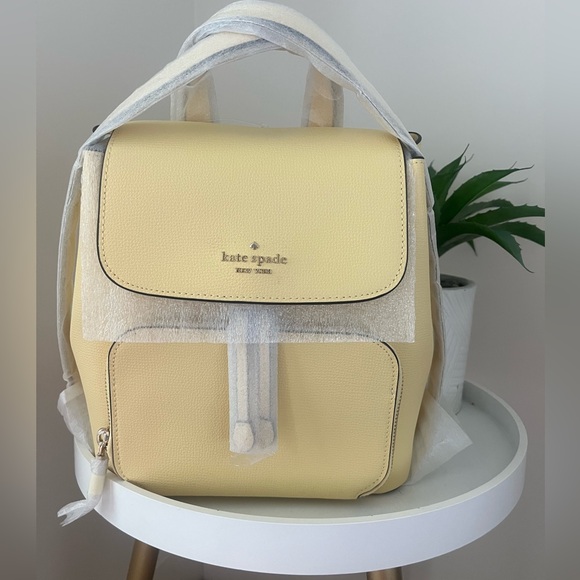 BNWT Kate Spade Kristi Medium Flip Backpack butter color - Picture 1 of 4